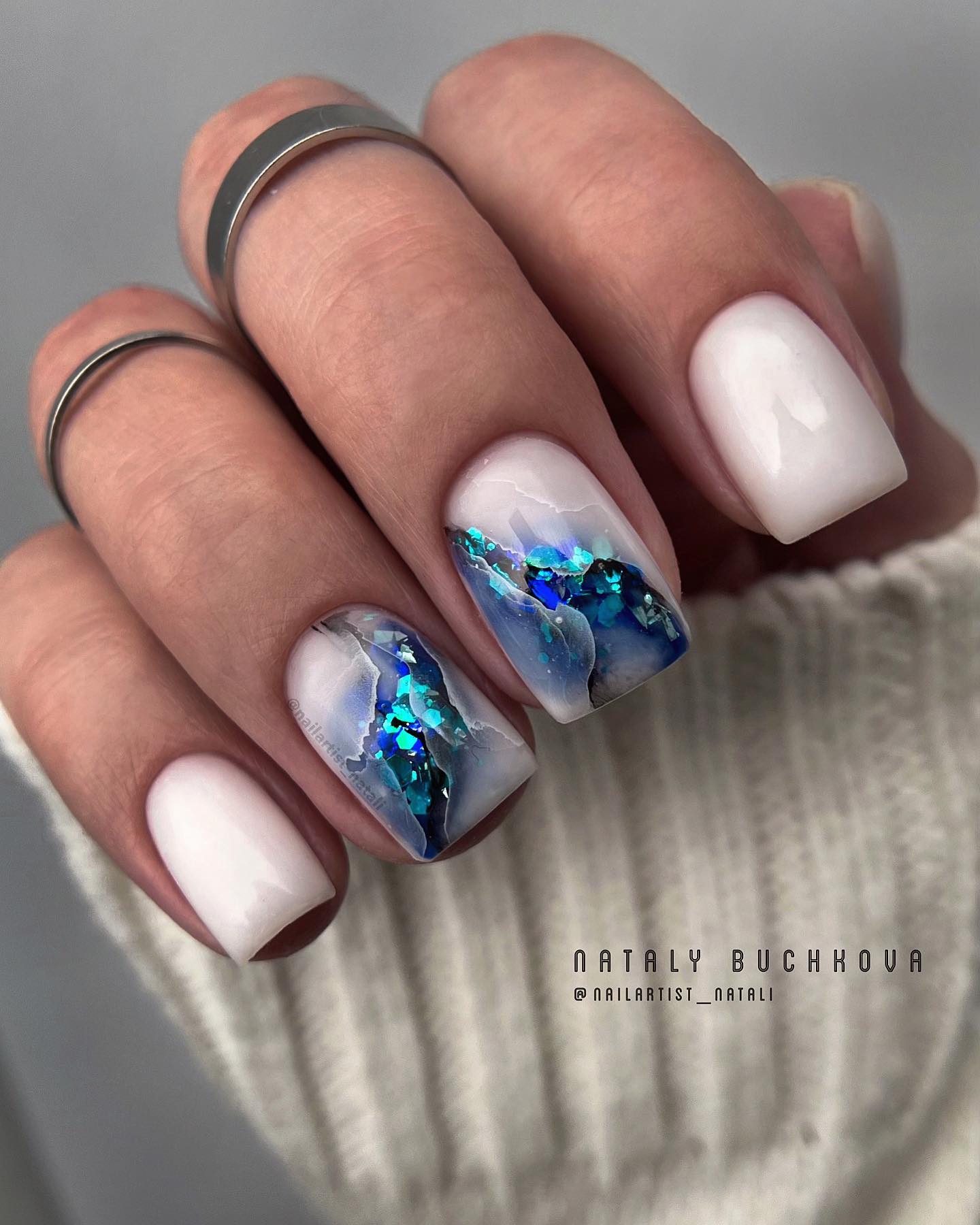 Short Milky Nails with Blue Glitter