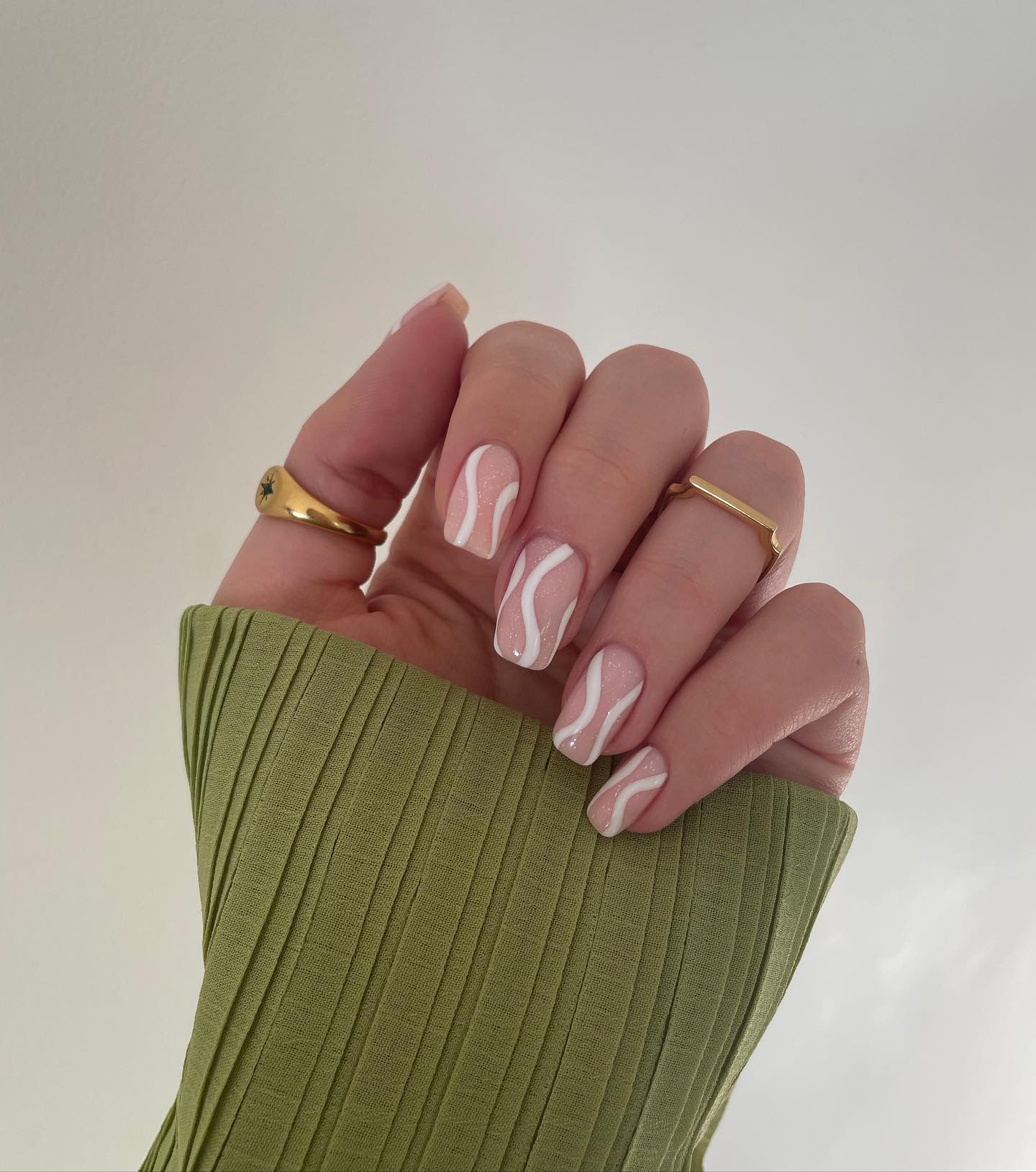  Short Square Nude Nails with White Swirls