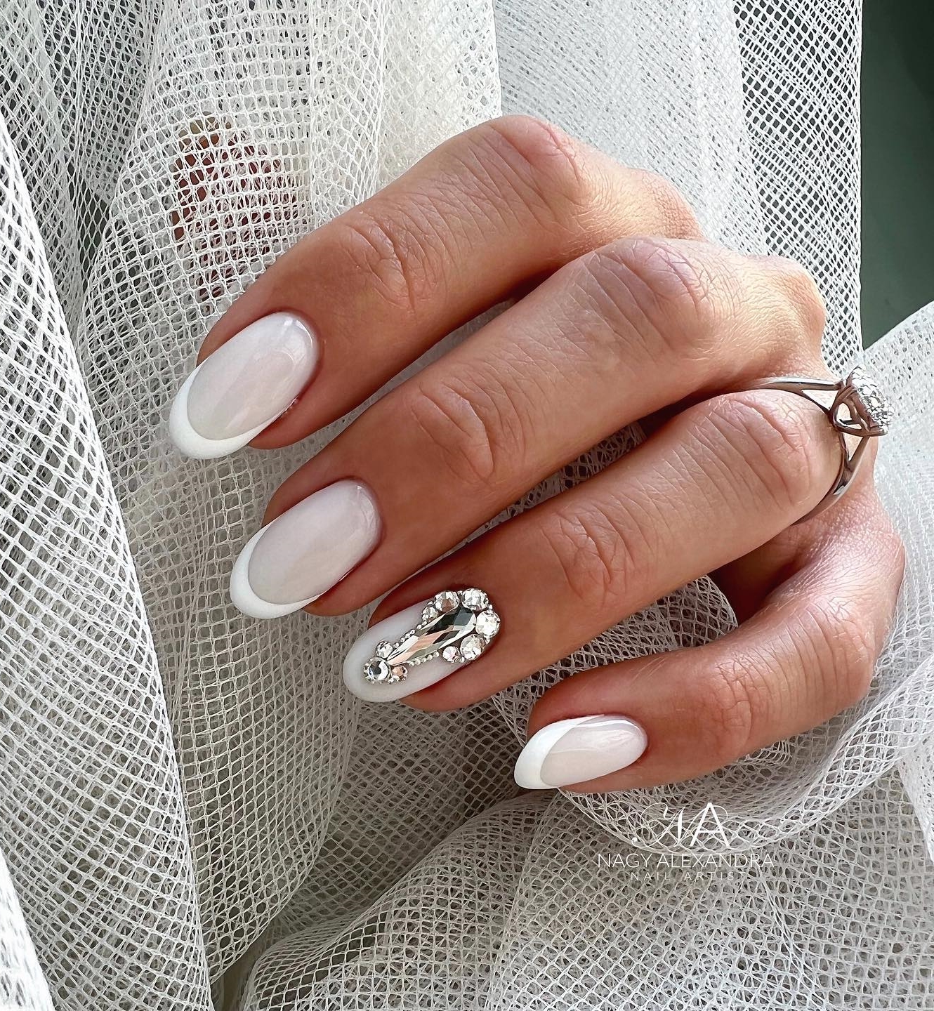 Round White French Nail Tips with Diamonds